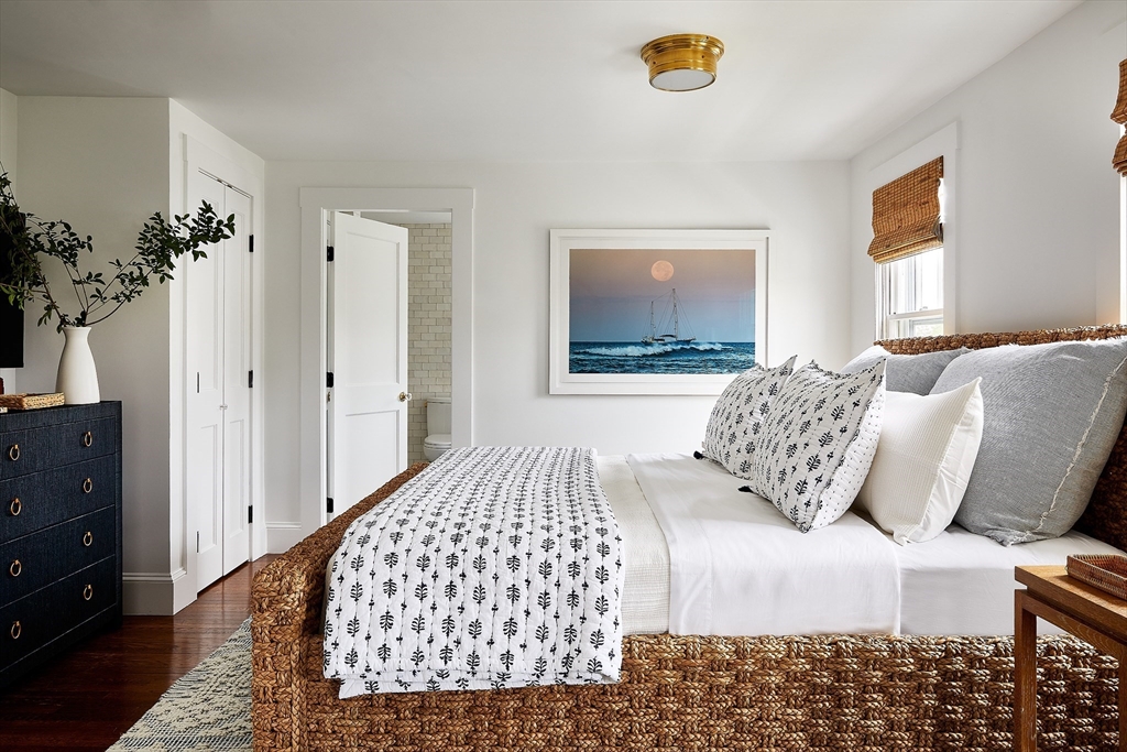 3 North Beach Street Nantucket, MA 02554 - Photo 6 of 13 a bedroom with a bed and a window