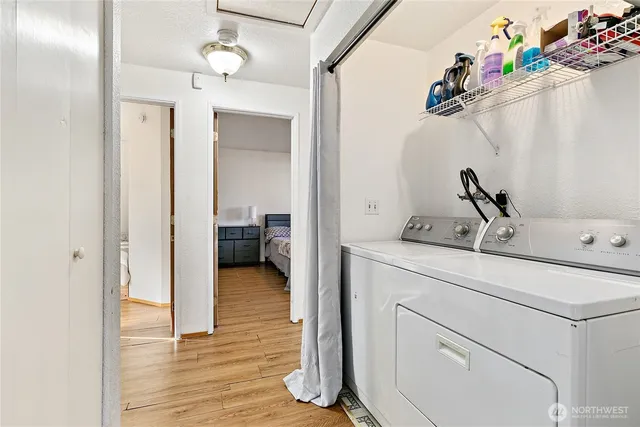 a en suite bathroom with a sink mirror and vanity