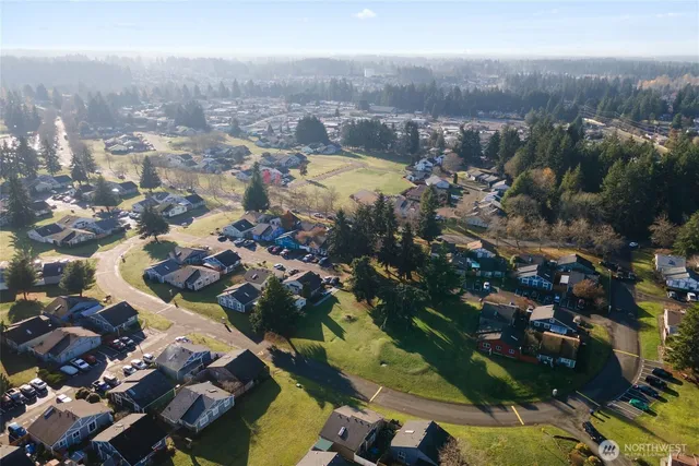 an aerial view of residential building with parking space