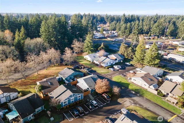 an aerial view of a swimming pool patio and mountain view