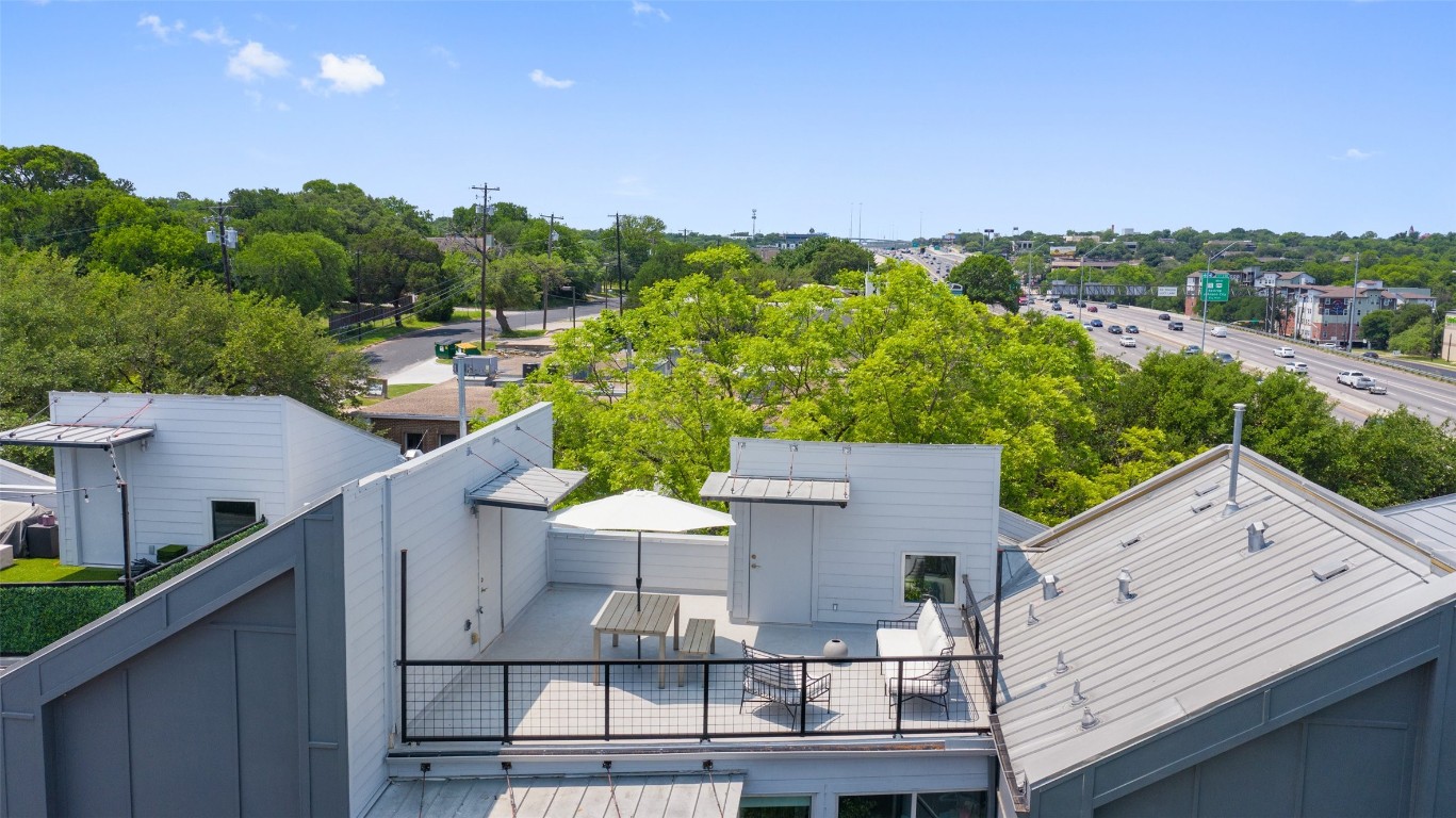 1500 Summit Street, Unit 5 Austin, TX 78741 - Photo 2 of 38 a view of a balcony with chairs