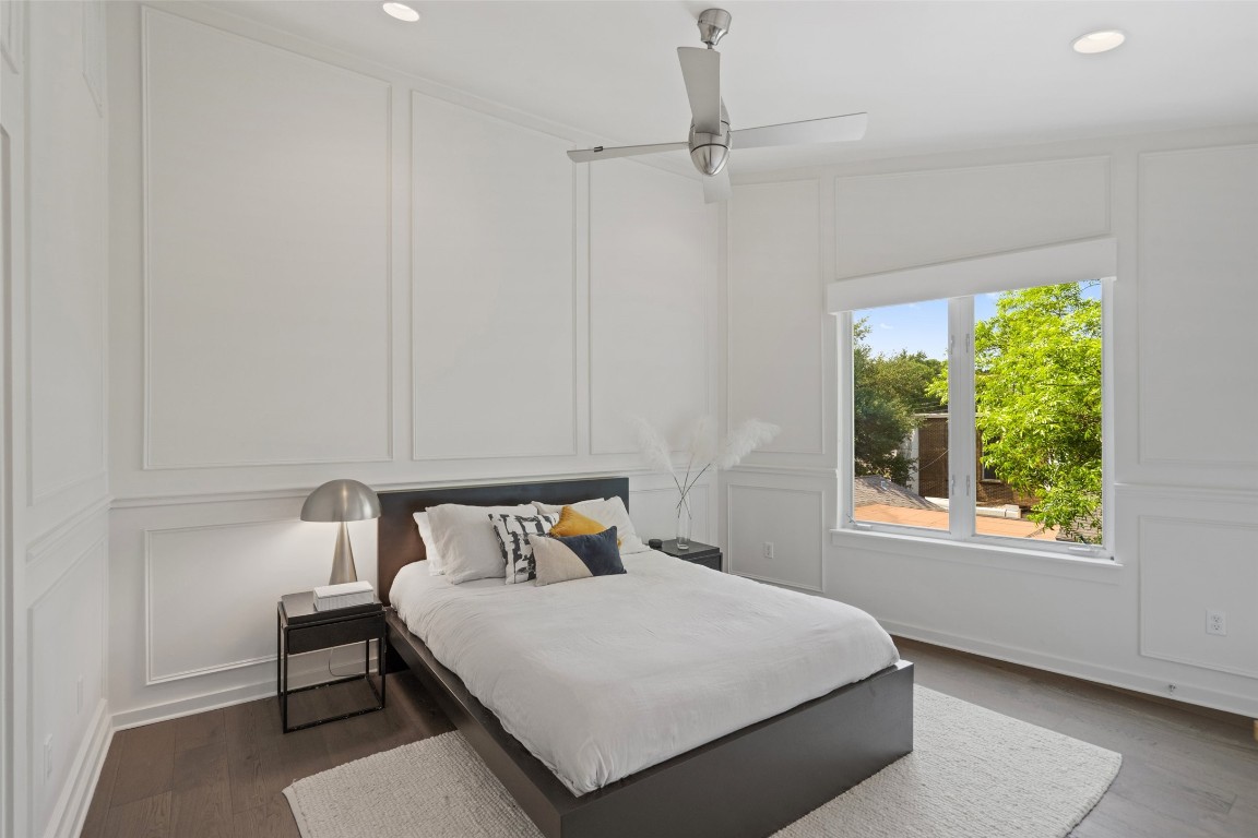 1500 Summit Street, Unit 5 Austin, TX 78741 - Photo 25 of 38 a bedroom with a bed and window