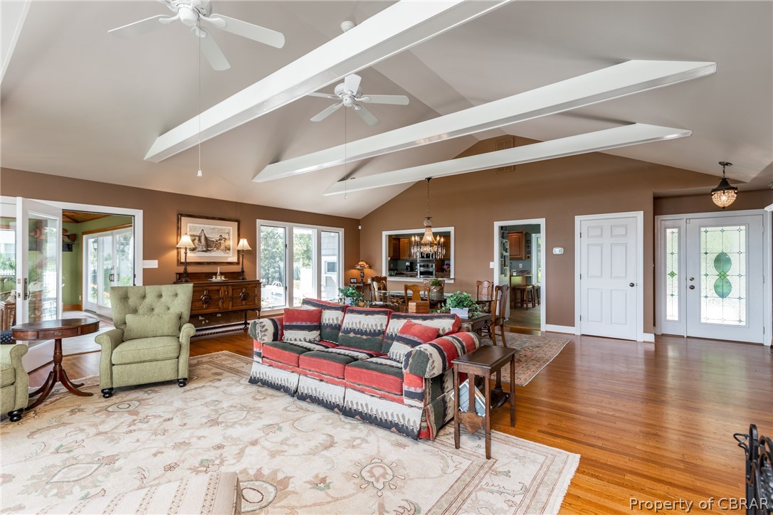 901 Oak Hill Road Lancaster, VA 22503 - Photo 15 of 49 a living room with furniture and a large window