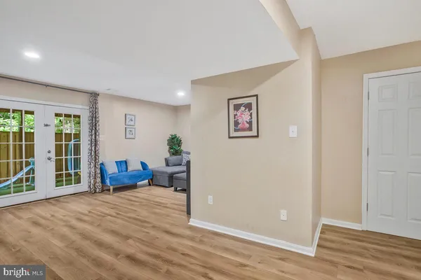 a view of a livingroom with furniture and wooden floor