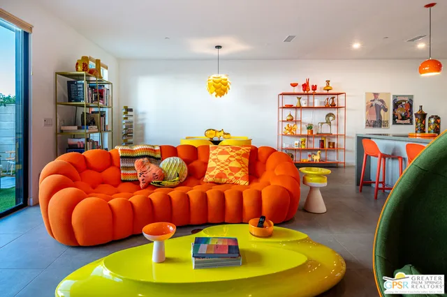 a view of a book shelf in a room