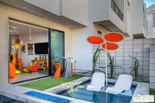 a room with musical instruments and air hockey table
