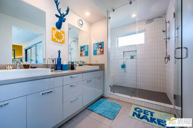 a view of a swimming pool with a lounge chairs