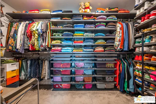 a living room with fireplace furniture and a flat screen tv