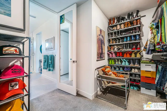 a large kitchen with a table and chairs