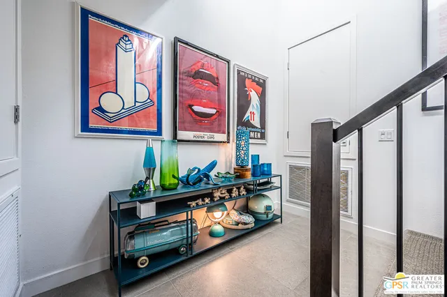 a view of a patio with table and chairs