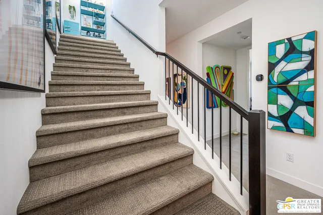 a view of a palm trees in front of a building