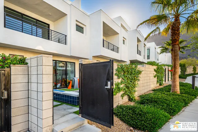 a view of swimming pool with a patio