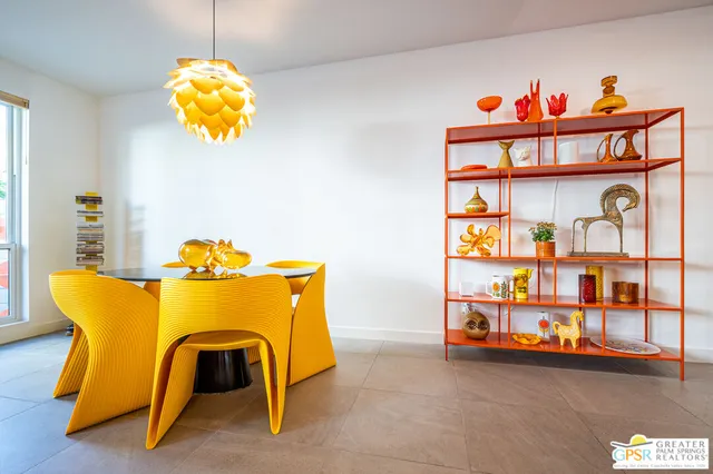 a very nice looking bedroom with a bed and a table