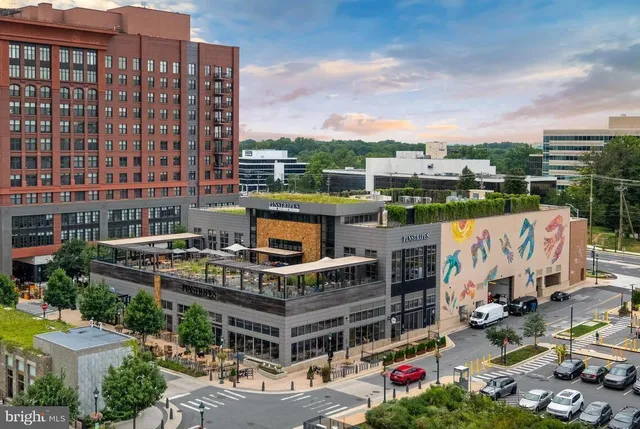 a view of a building and a people on a street