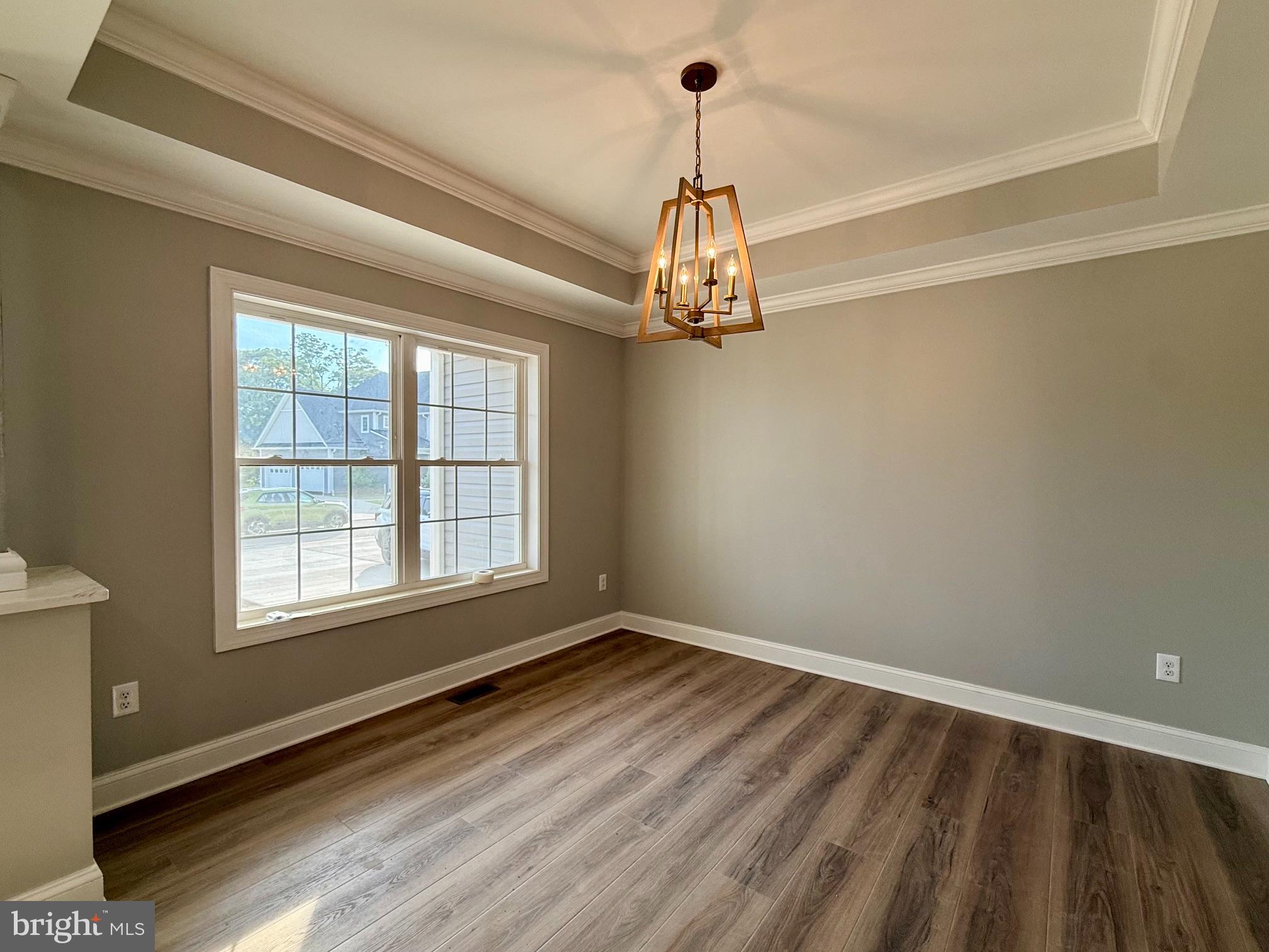 17480 Lighthouse Commons Drive Piney Point, MD 20674 - Photo 11 of 23 a view of empty room with wooden floor and window