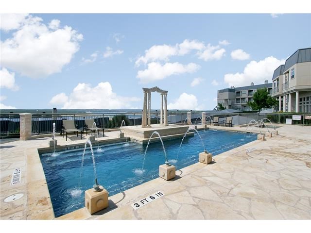 2918 Ranch Road 620, Unit K170 Austin, TX 78734 - Photo 20 of 22 An inviting community pool with playful fountains, perfect for enjoying sunny days.