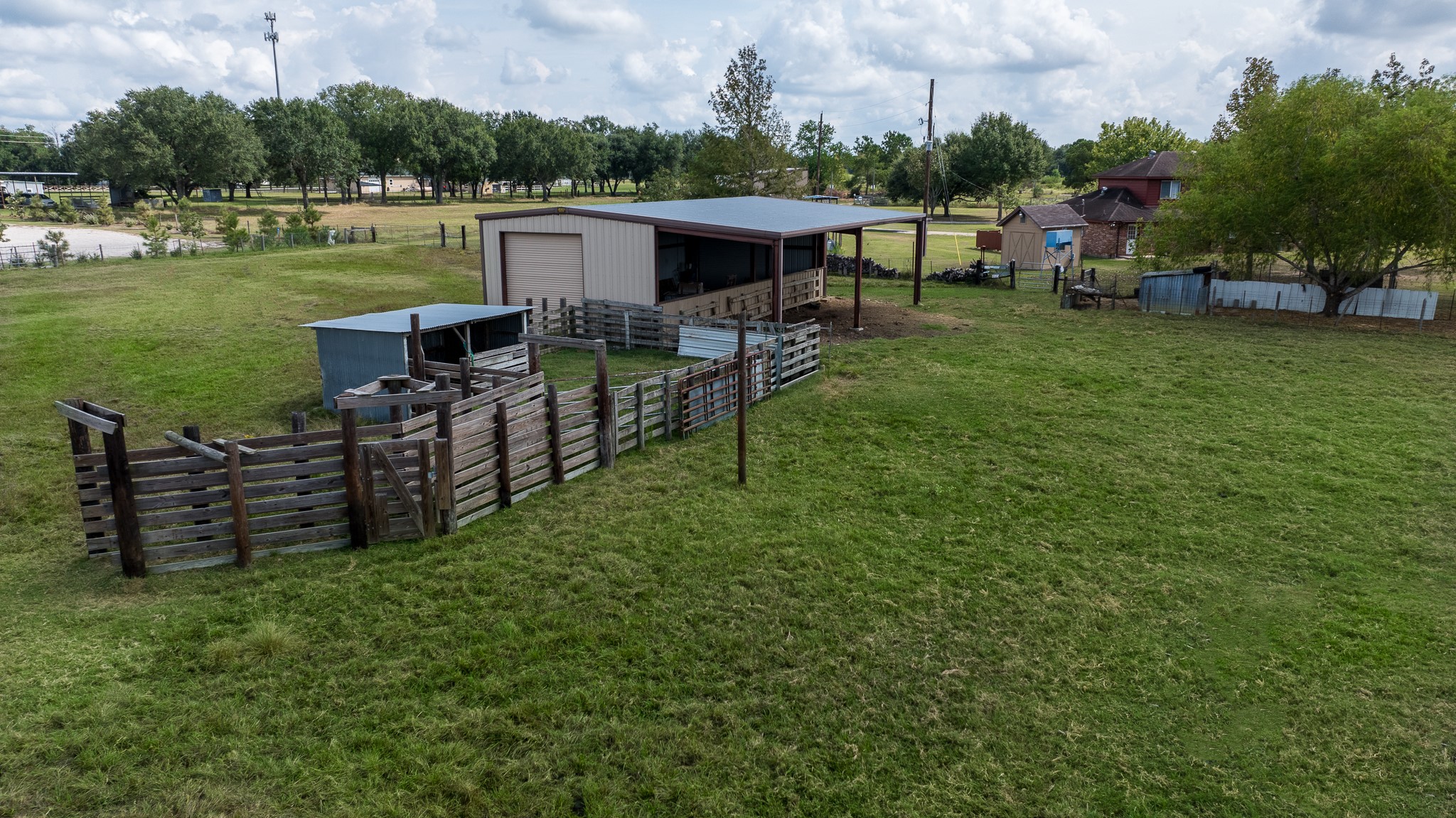 19105 Mueschke Road Tomball, TX 77377 - Photo 13 of 16 a view of a chairs and table in the yard