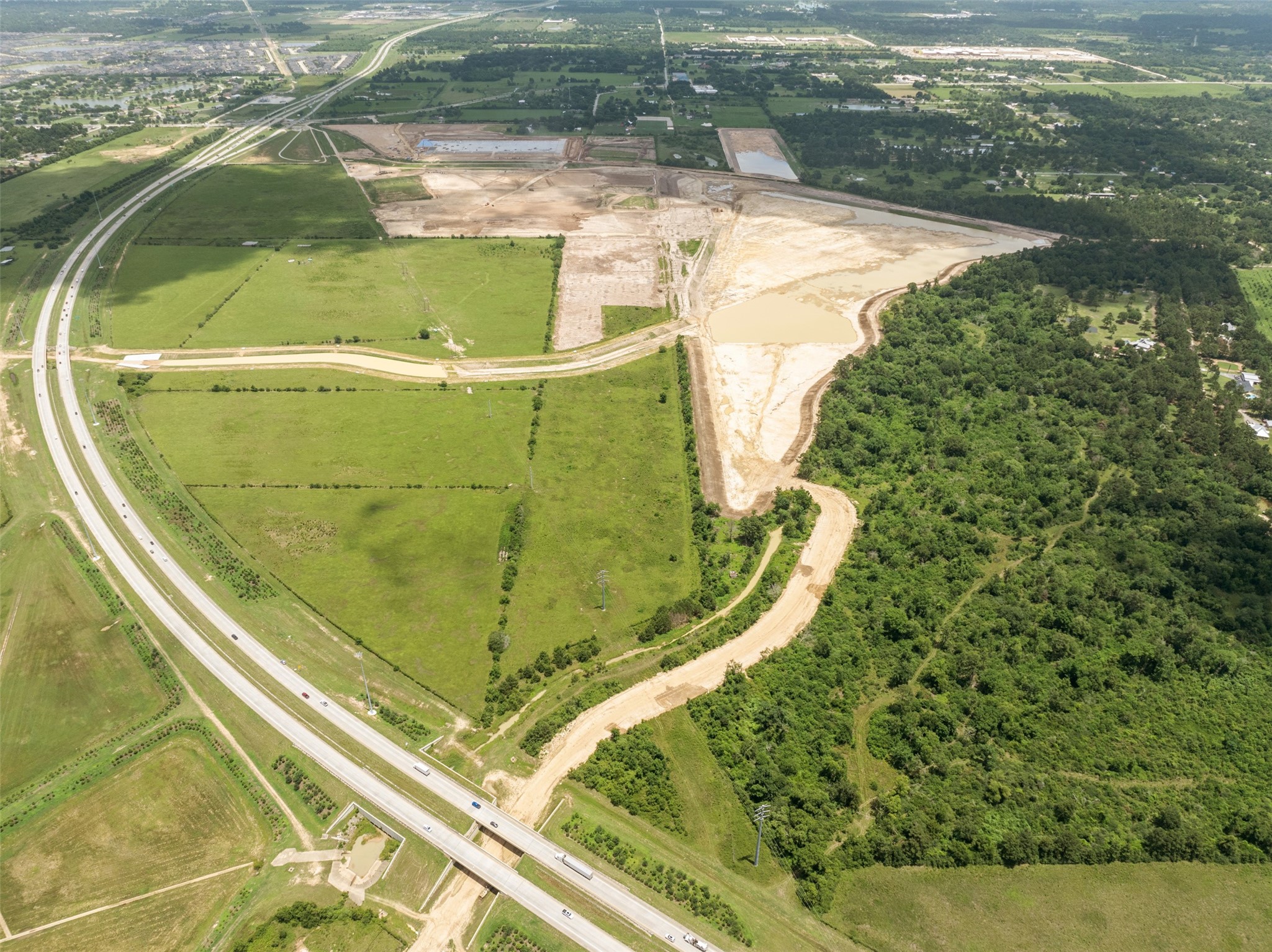 19105 Mueschke Road Tomball, TX 77377 - Photo 6 of 16 a view of a swimming pool with a balcony