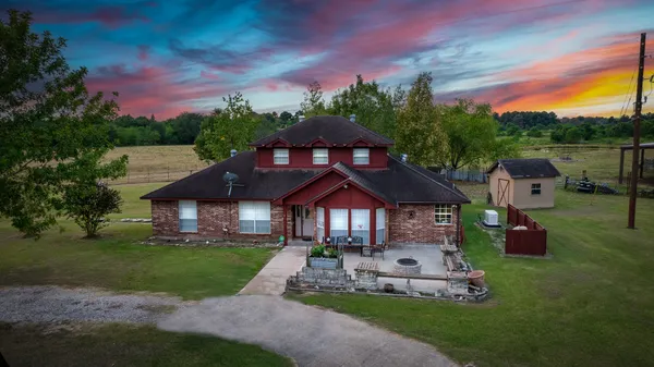 a view of a garden with a lake