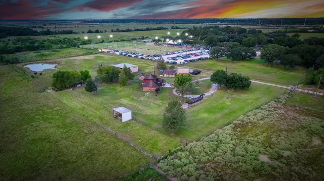a view of a lake with huge green field