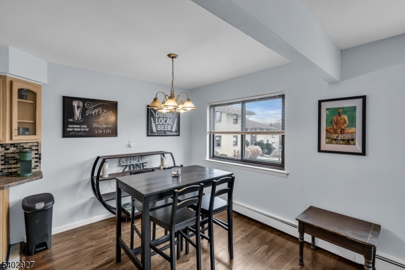 401 Highway 22, Unit D Plainfield, NJ 07060 - Photo 9 of 16 a dining room with furniture and window