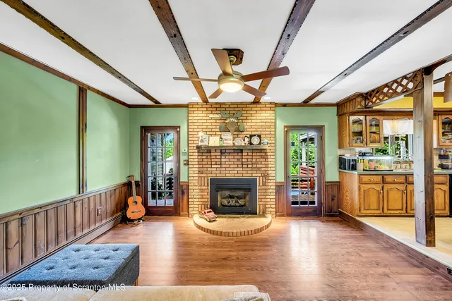 a view of an entryway with a fireplace