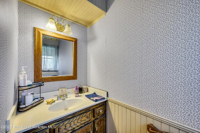 a bed room with a bed and a dresser