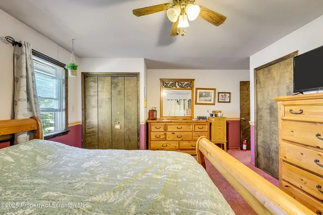 a bathroom with a shower curtain