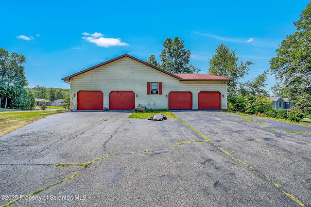 a view of outdoor space yard and garage