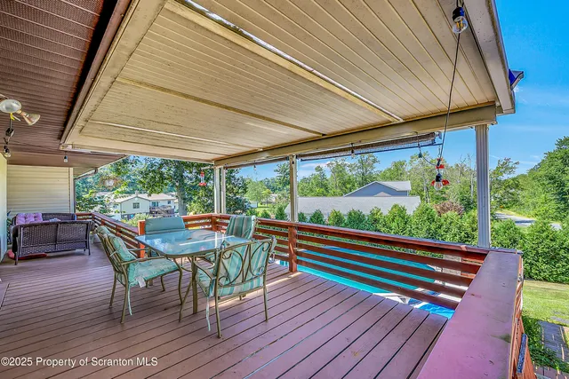 a view of a two chairs in the deck