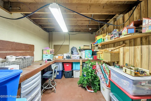 a view of a livingroom with furniture window and wooden floor