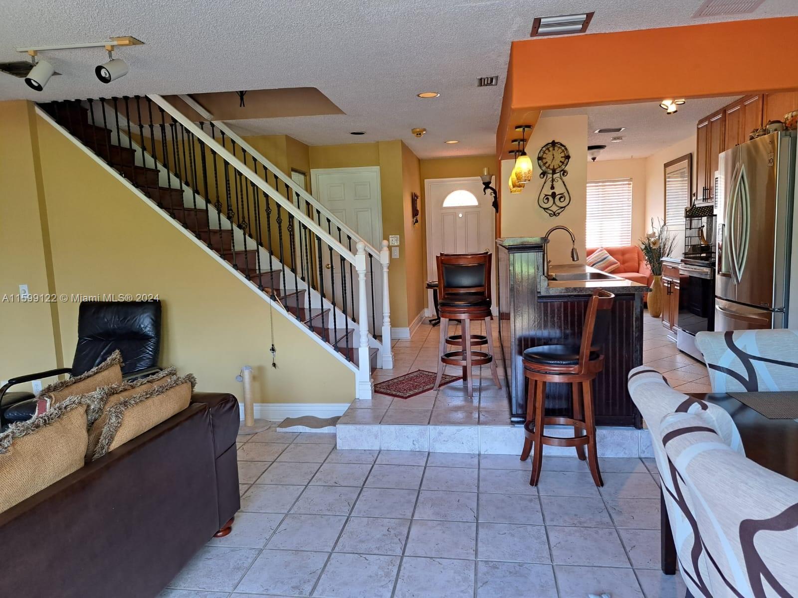 Jacaranda Plantation, FL 33324 - Photo 9 of 23 a view of a livingroom with furniture and a furniture