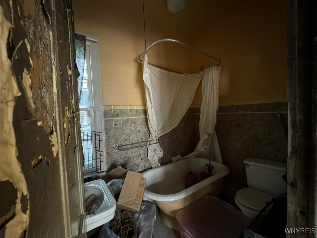431 Normal Avenue Buffalo, NY 14213 - Photo 23 of 29 Bathroom is located from the kitchen