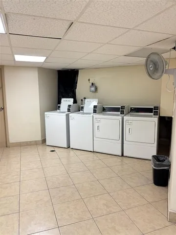 a view of a living room with windows