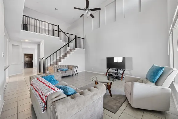 a living room with furniture and a couch