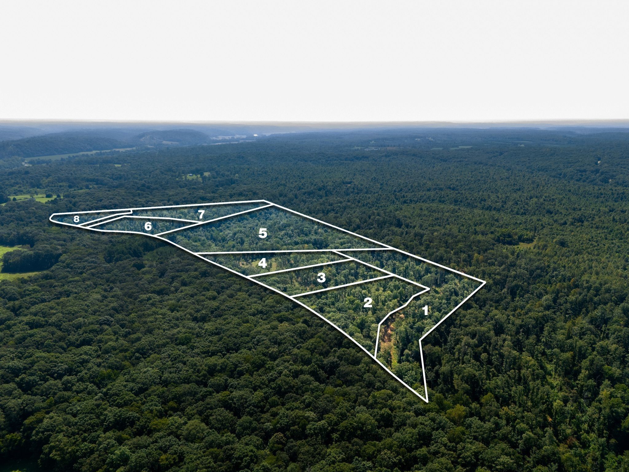 an aerial view of residential house with outdoor space