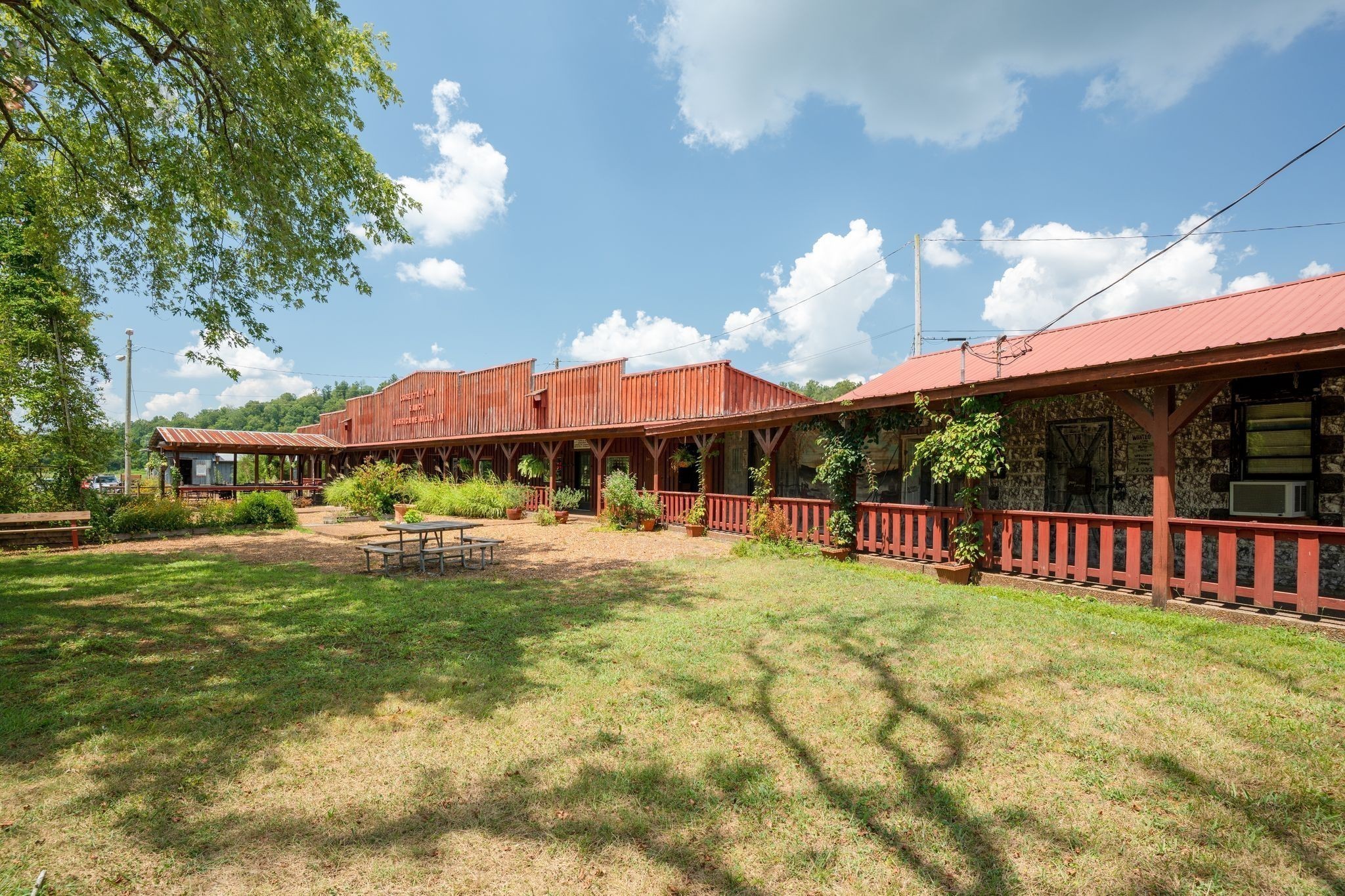 715 Dyer Road Hurricane Mills, TN 37078 - Photo 26 of 36 a view of a house with swimming pool and porch with furniture