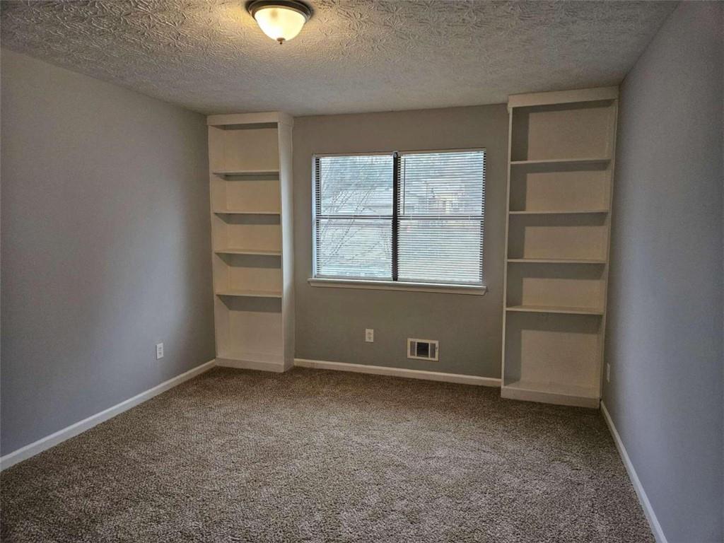 4321 Sebring Walk Decatur, GA 30034 - Photo 15 of 31 an empty room with windows and closet