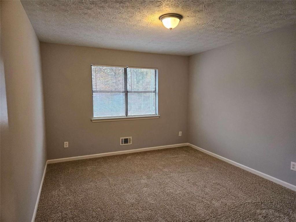 4321 Sebring Walk Decatur, GA 30034 - Photo 17 of 31 an empty room with a window