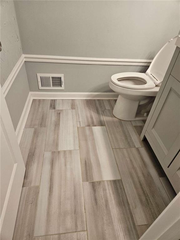 4321 Sebring Walk Decatur, GA 30034 - Photo 26 of 31 a bathroom with a sink and a toilet