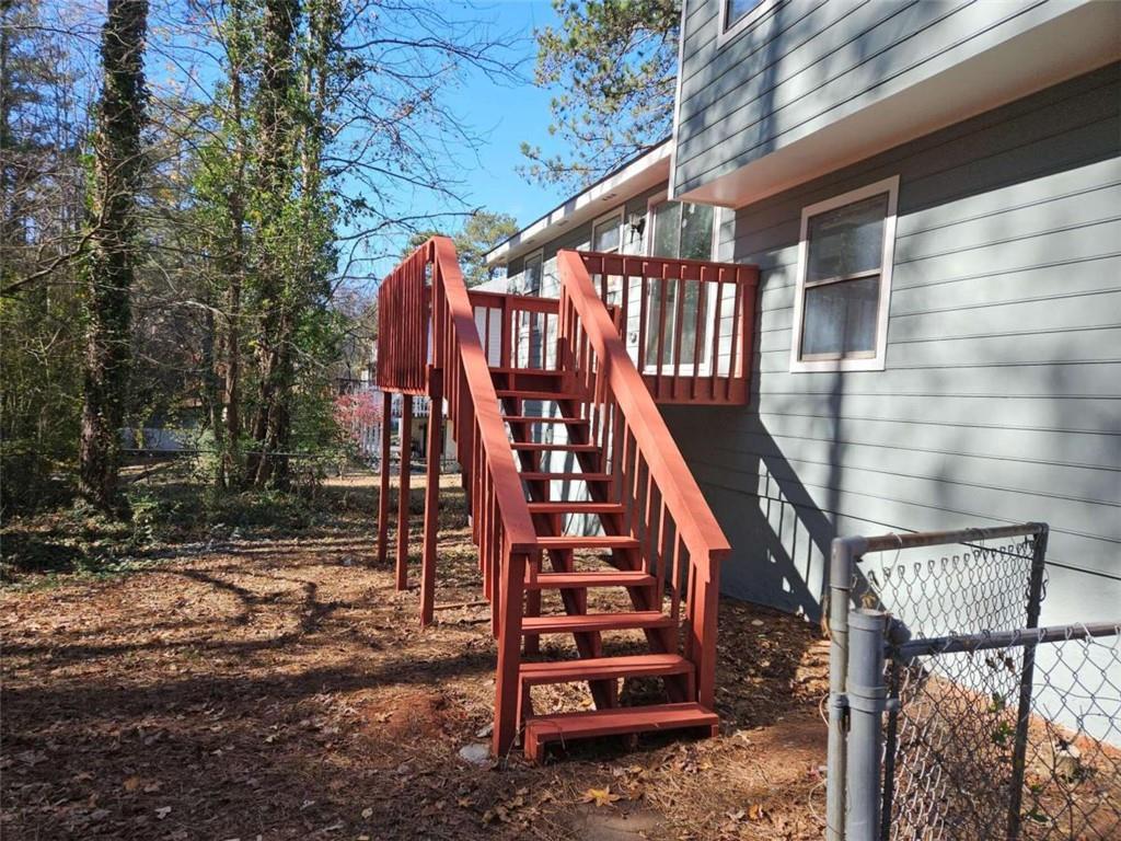 4321 Sebring Walk Decatur, GA 30034 - Photo 29 of 31 a view of entryway with wooden stairs