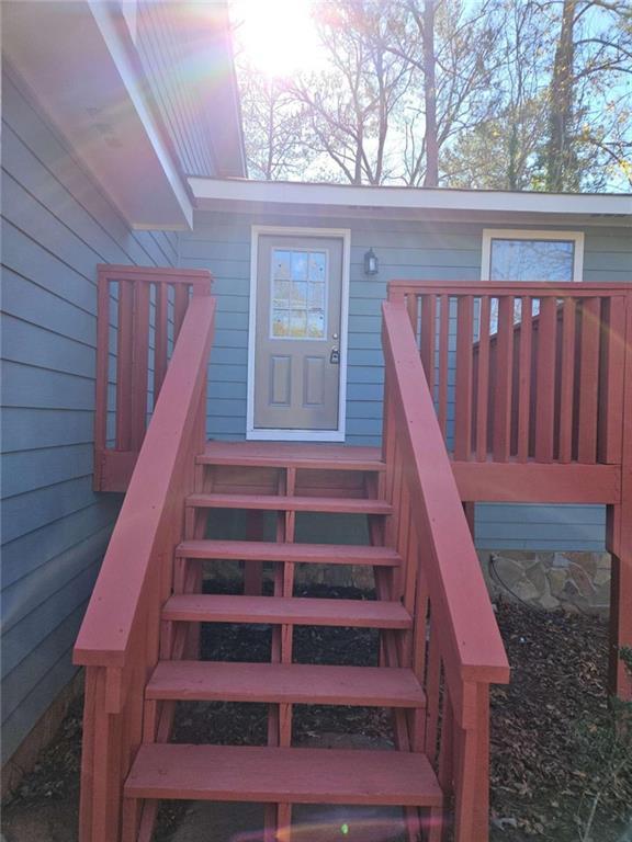 4321 Sebring Walk Decatur, GA 30034 - Photo 3 of 31 a view of entryway with wooden floor and a front door