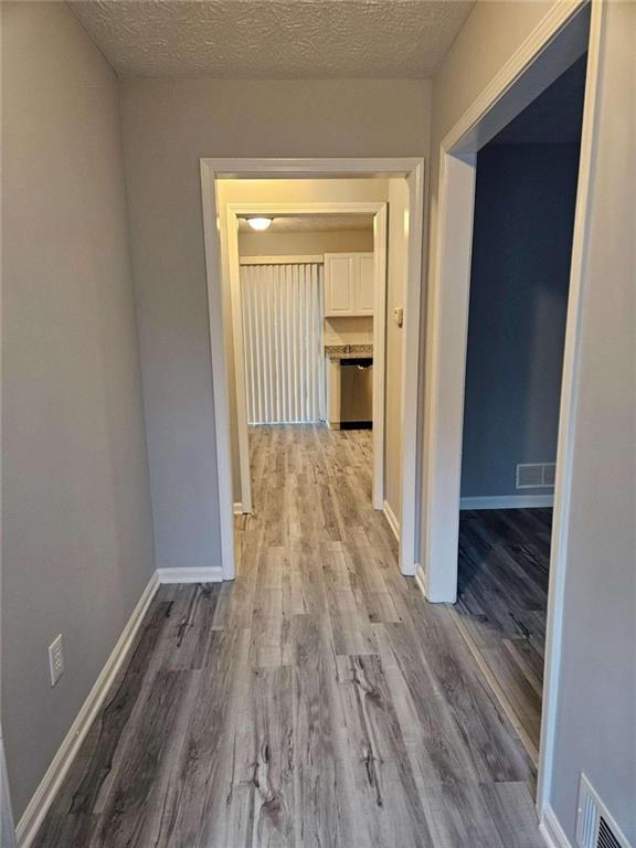 4321 Sebring Walk Decatur, GA 30034 - Photo 4 of 31 a view of a hallway with wooden floor