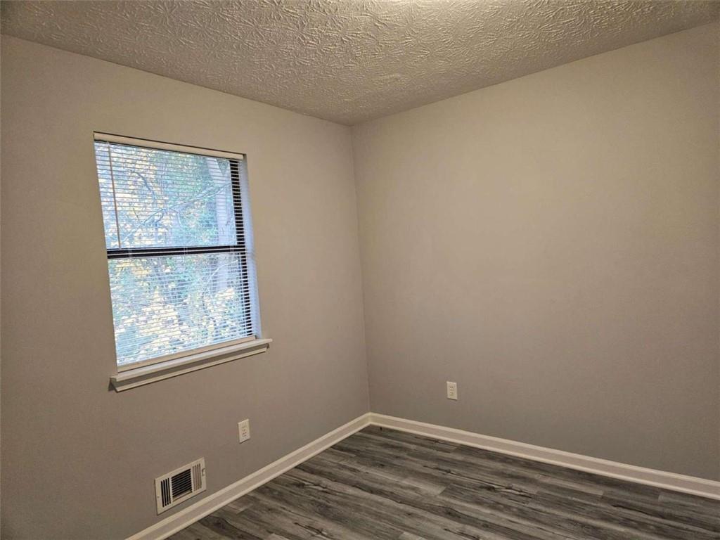 4321 Sebring Walk Decatur, GA 30034 - Photo 10 of 31 a view of an empty room with a window