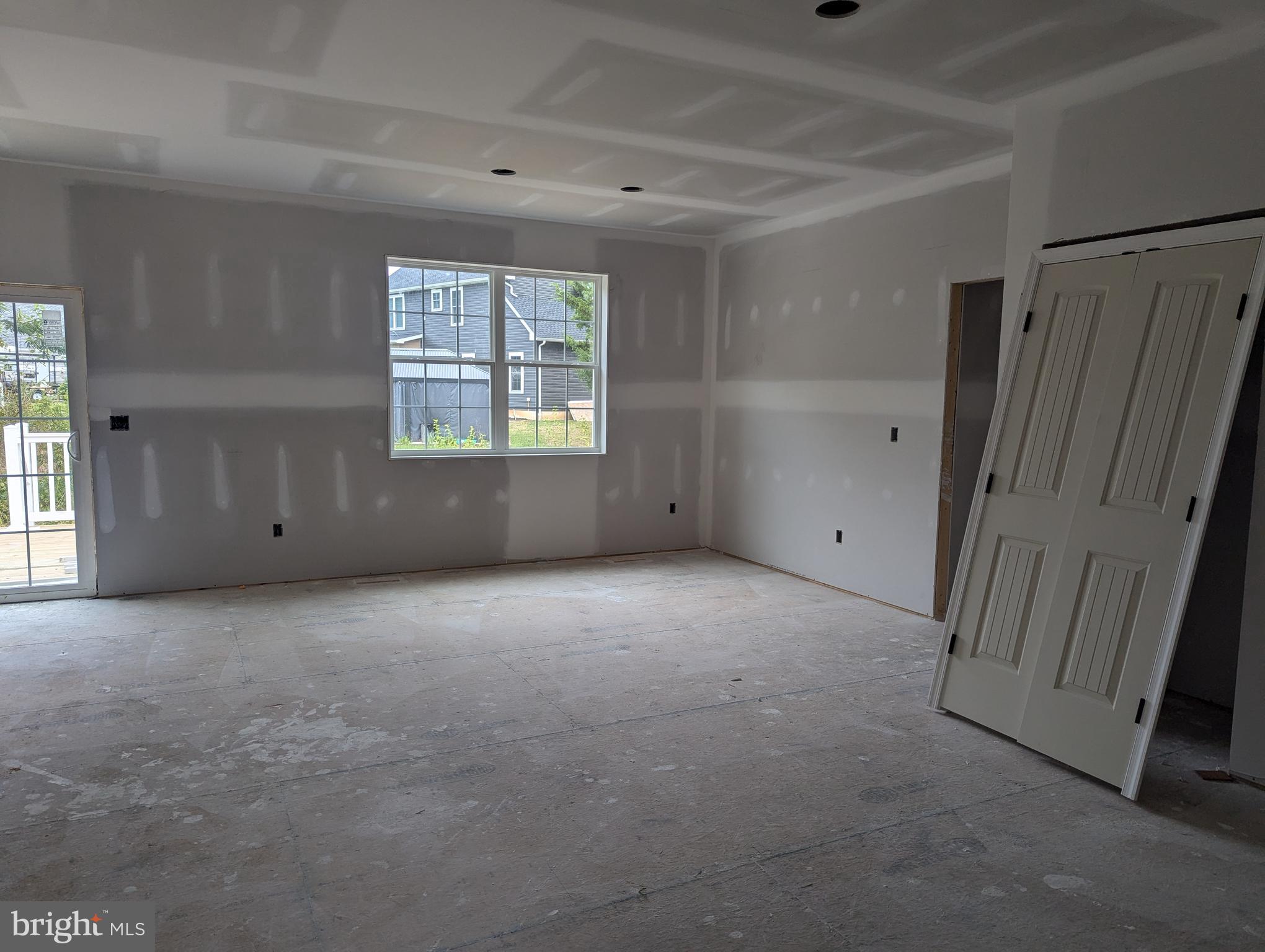4217 Midstate Road Felton, DE 19943 - Photo 4 of 11 an empty room with windows and closet