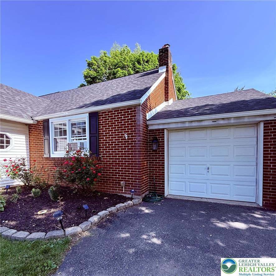 1275 Macada Road Bethlehem, PA 18017 - Photo 81 of 87 a front view of a house with a garden