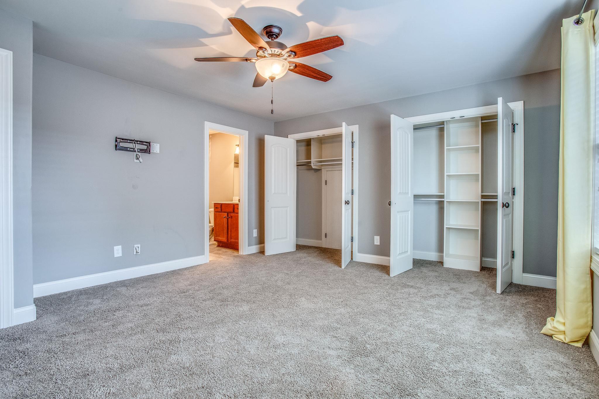 7026 Brindle Ridge Way Spring Hill, TN 37174 - Photo 17 of 23 Bedroom #3 has 2 large closets with custom shelving.