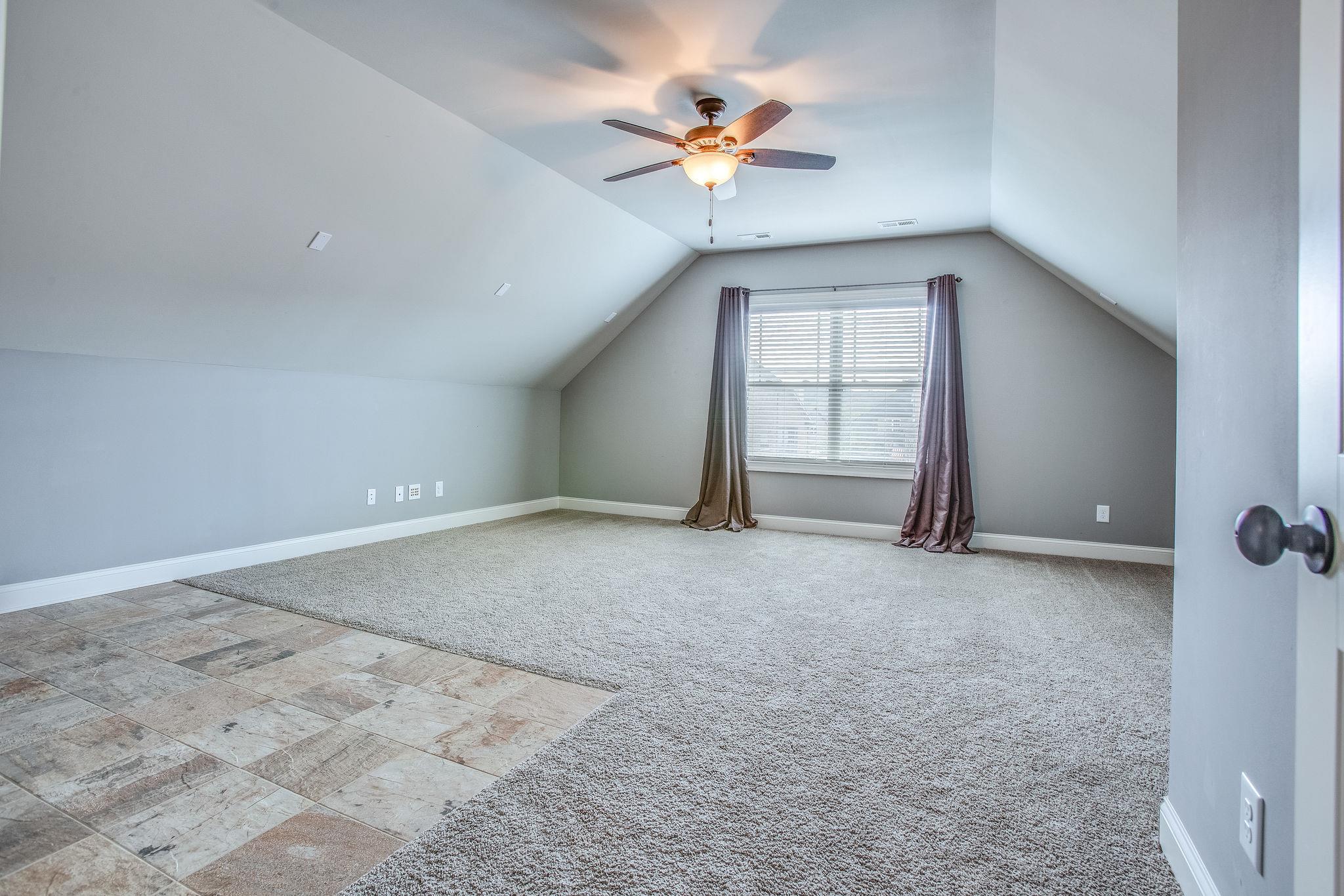 7026 Brindle Ridge Way Spring Hill, TN 37174 - Photo 20 of 23 Extra large bonus room wired for surround sound.