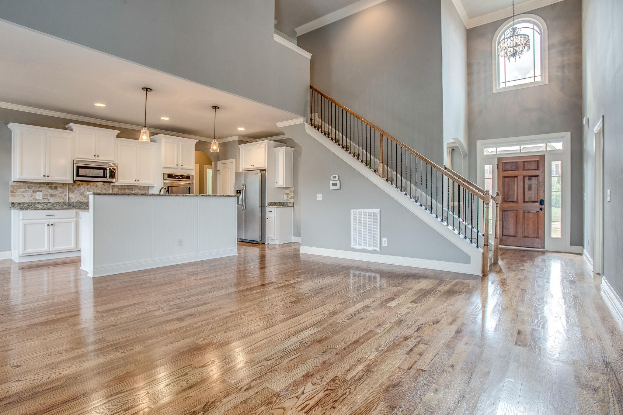 7026 Brindle Ridge Way Spring Hill, TN 37174 - Photo 5 of 23 Living room open to the kitchen.
