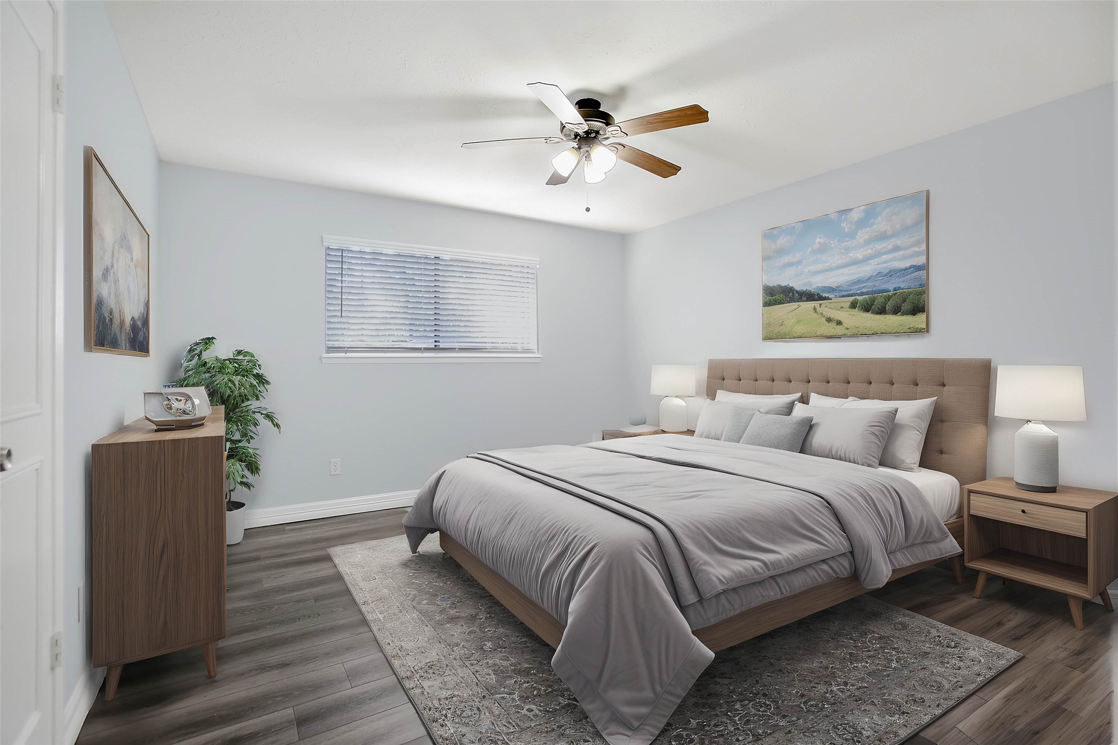 56 East White Willow Circle Spring, TX 77381 - Photo 18 of 45 a bedroom with bed and wooden floor